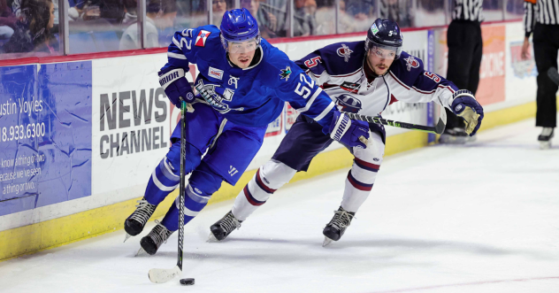 Wichita Thunder forward Barret Kirwin handles the puck vs. the Tulsa Oilers