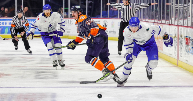 Wichita Thunder eye the puck against the Tulsa Oilers