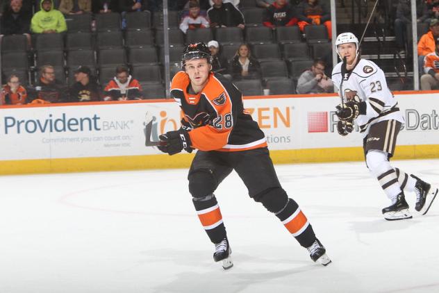 Lehigh Valley Phantoms' Nick Lappin and Hershey Bears' Mike Sgarbossa on the ice