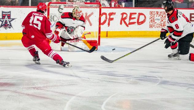 Liam Finlay of the Allen Americans (left) vs. the Rapid City Rush