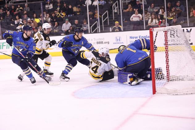 Providence Bruins' Chris Wagner battles Springfield Thunderbirds' Vadim Zherenko