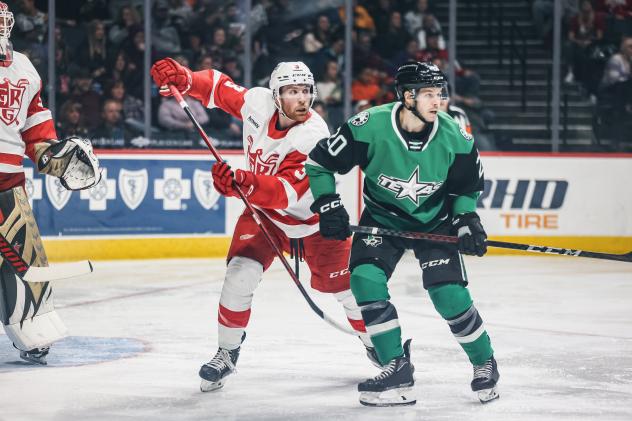 Grand Rapids Griffins' Jared McIsaac and Texas Stars' Tanner Kero in action