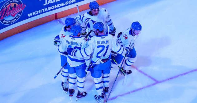 Wichita Thunder huddle after a goal