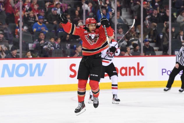 Calgary Hitmen forward London Hoilett celebrates 2022 ENMAX Teddy Bear Toss Goal