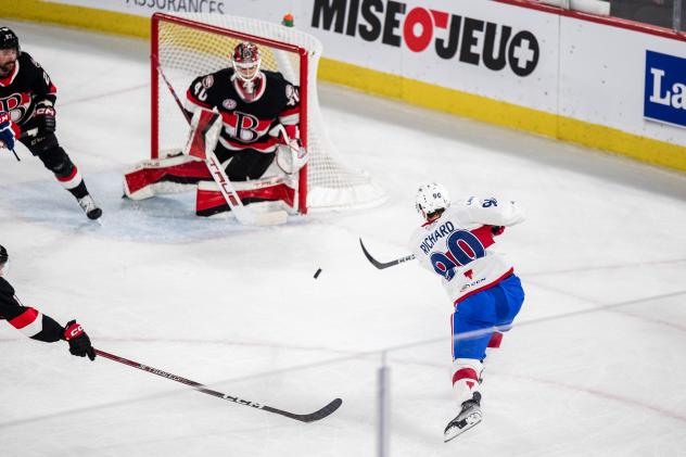 Laval Rocket's Anthony Richard in action against Belleville Senators' Mads Sogaard