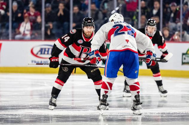 Belleville Senators' Rourke Chartier faces off against Lava Rocket's Alex Belzile
