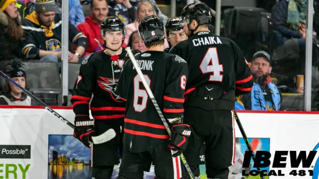 Indy Fuel's Nate Pionk and Kirill Chaika talk with teammates