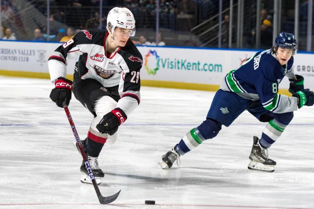 Vancouver Giants' Samuel Honzek and Seattle Thunderbirds' Bryce Pickford in action