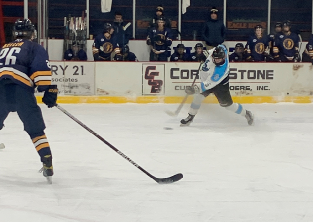 Daniil Dolzhenko of the Wisconsin Windigo fires a shot