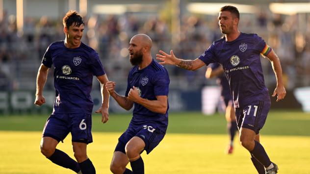 Louisville City FC celebrates after a goal