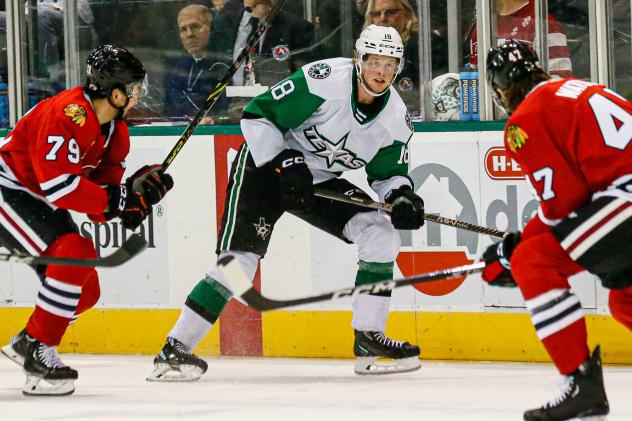 Texas Stars' Fredrik Karlstrom Battles Rockford Icehogs' Dylan Sikura And Cliff Watson