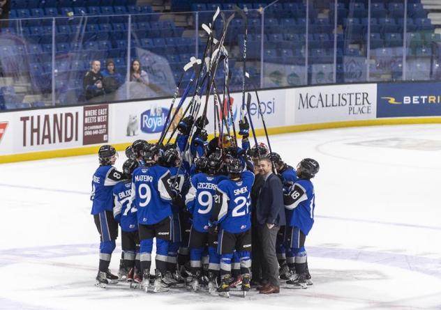 Saint John Sea Dogs raise their sticks