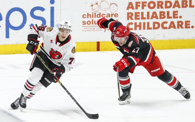 Rockford IceHogs' Jakub Galvas and Grand Rapids Griffins' Austin Czarnik in action