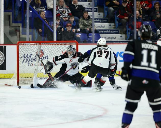 Vancouver Giants' Jesper Vikman and Kyren Gronick in action