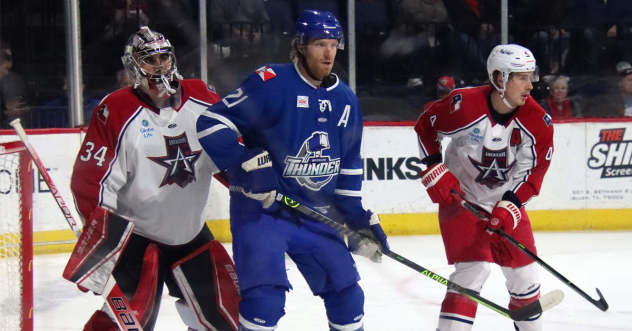 Wichita Thunder's Jay Dickman and Allen Americans' Kevin Mandolese and Kris Myllari