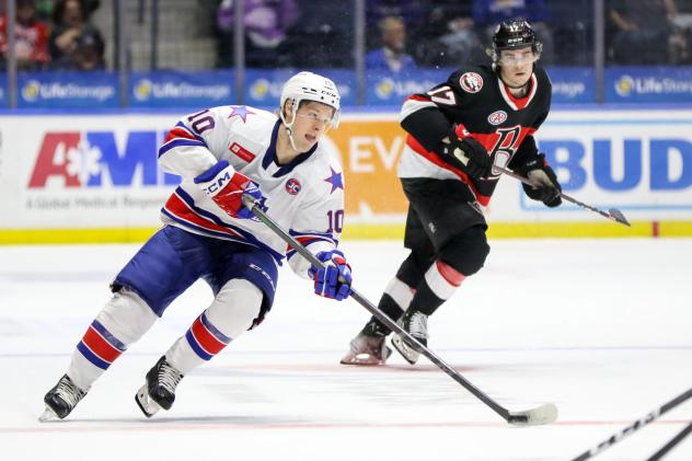 Rochester Americans' Brandon Biro And Belleville Senators' Ridly Greig In Action