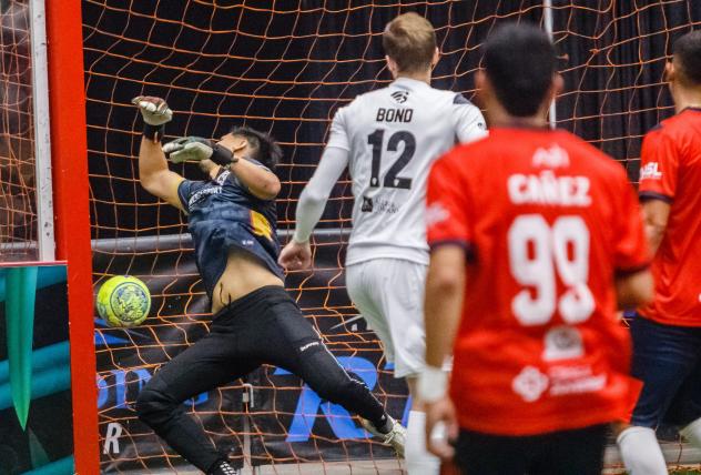 Florida Tropics forward Taylor Walter Bond beats Chihuahua Savage goalkeeper Ivan Munoz for a goal