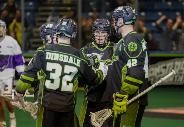 Saskatchewan Rush exchange congratulations after a goal