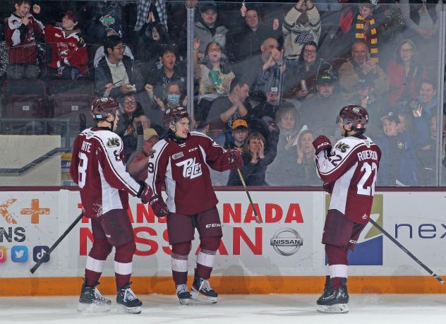 Peterborough Petes' Gavin White, Avery Hayes and Tucker Robertson on game night