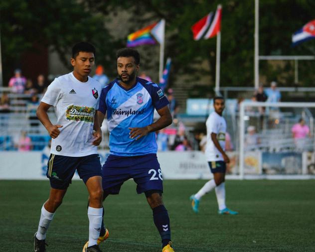 Forward Madison FC midfielder Andrew Wheeler-Omiunu (right)