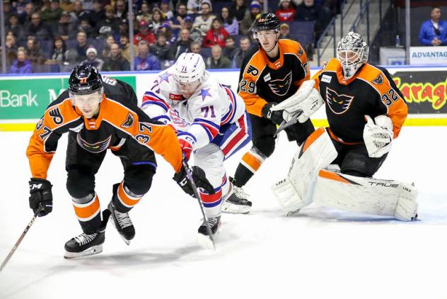 Lehigh Valley Phantoms defend against the Rochester Americans