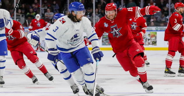 Wichita Thunder defenseman Kyle Rhodes (left) vs. the Allen Americans