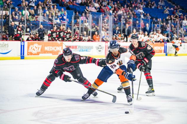 Rapid City Rush's Quinn Wichers And Colton Leiter Battle Tulsa Oilers' Dante Sheriff