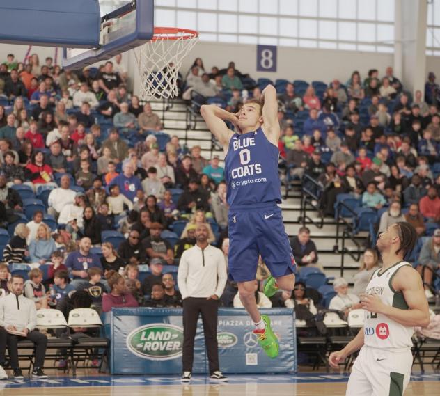 Delaware Blue Coats guard Mac McClung prepares a slam dunk