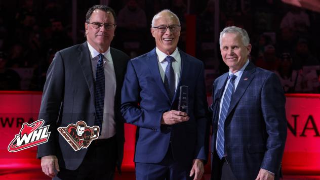 Calgary Hitmen Education Advisor Bernie Bajnok (center)