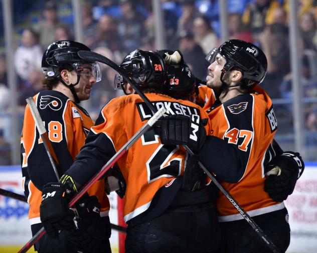 Lehigh Valley Phantoms' Jackson Cates, Olle Lyckselland and Louie Belpedio celebrate win