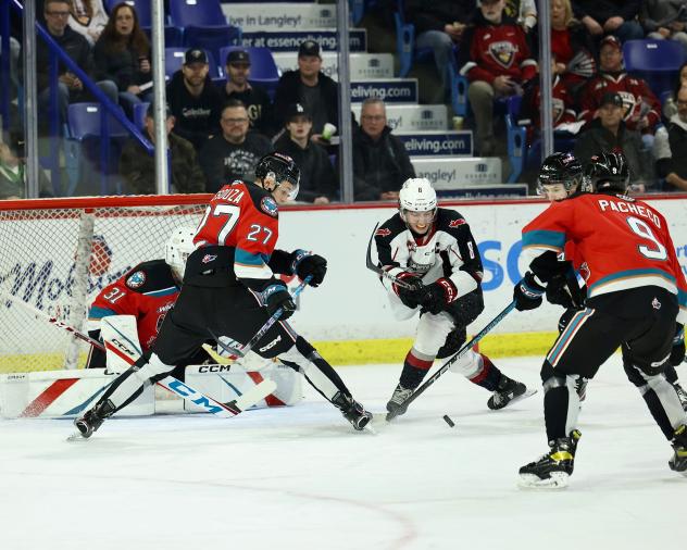 Kelowna Rockets' Jackson DeSouza and Marcus Pacheco on the ice