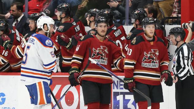 Tucson Roadrunners' Laurent Dauphin and Nathan Smith