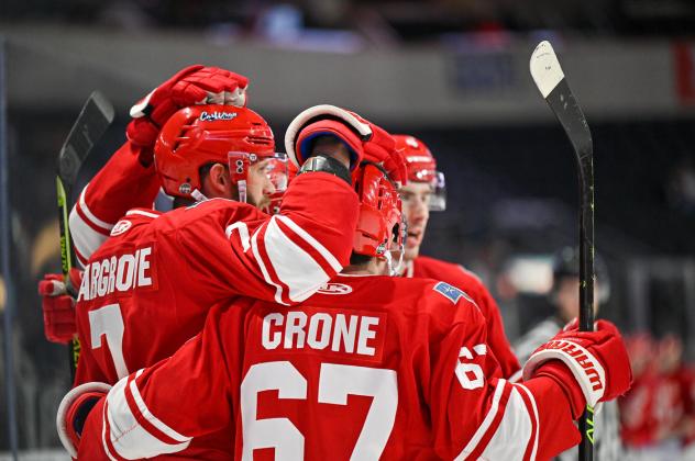 Allen Americans celebrate a goal by Hank Crone