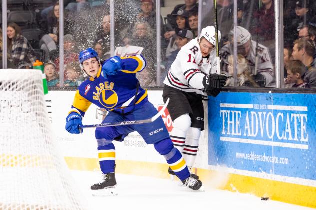 Red Deer Rebel's Craig Armstrong hits the glass