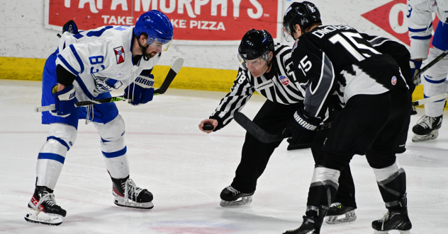 Wichita Thunder forward Jake Wahlin (left) prepares for a faceoff against the Idaho Steelheads