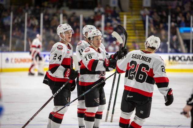 Belleville Senators' Jacob Bernard-Docker, Matthew Boucher and Brennan Saulnier on game night