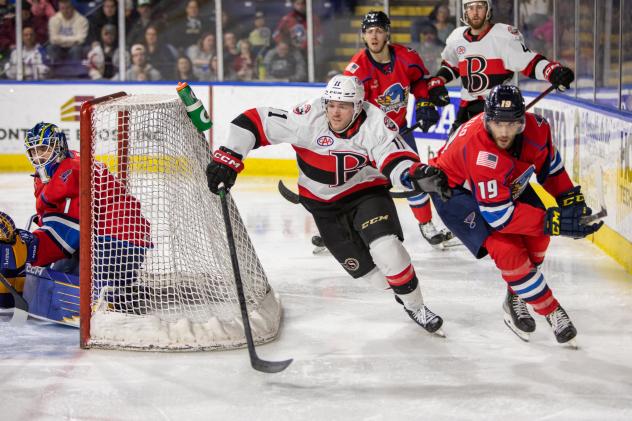 Belleville Senators' Kyle Betts and Springfield Thunderbirds' Anthony Angello in action