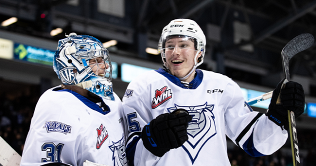 Victoria Royals' Braden Holt and Reggie Newman celebrate win