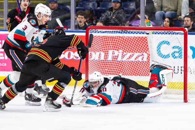 Kelowna Rockets' Ismail Abougouche and Jari Kykkanen in action