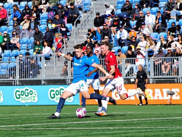 Defender Cale Loughrey with FC Edmonton