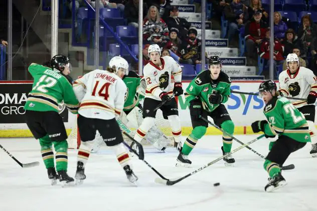 Vancouver Giants' Connor Dale and Ethan Semeniuk take on the Prince Albert Raiders
