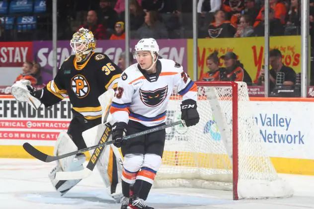 Lehigh Valley Phantoms' Bobby Brink and Providence Bruins' Brandon Bussi on game night
