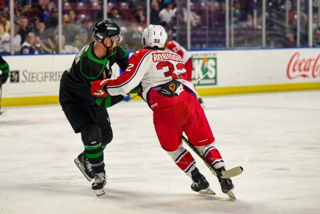 Allen Americans right wing Mikael Robidoux (right) vs. the Utah Grizzlies