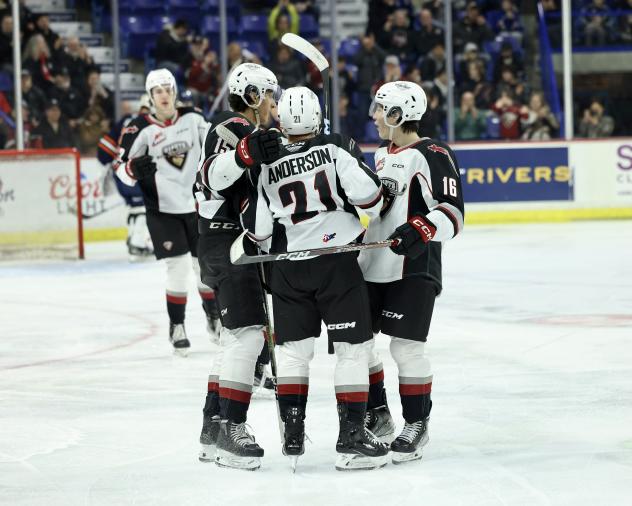 Vancouver Giants' Jaden Lipinski, Dylan Anderson and Will Subject on game night
