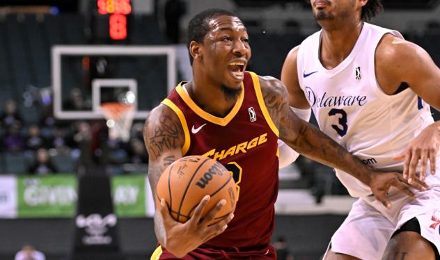 Gabe Osabuohien of the Cleveland Charge drives against the Delaware Blue Coats