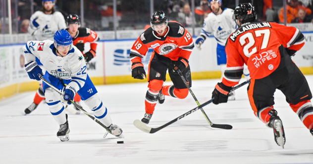 Wichita Thunder forward Michal Stinil (left) vs. the Kansas City Mavericks