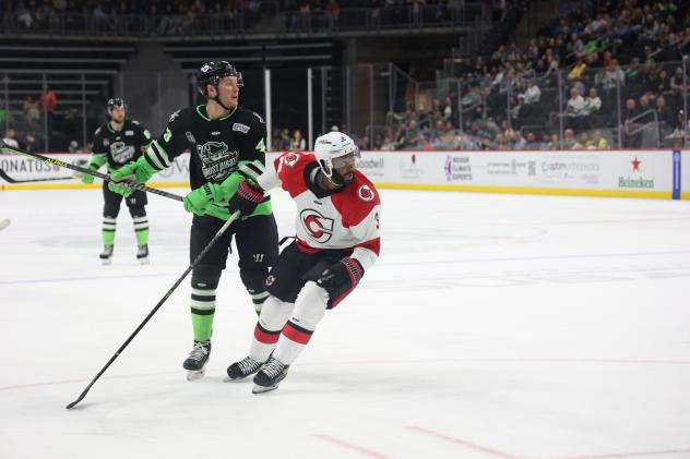 Savannah Ghost Pirates' Vincent Marleau and Cincinnati Cyclones' Josh Burnside on game night