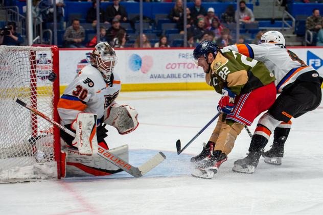 Lehigh Valley Phantoms' Samuel Ersson and Hartford Wolf Pack's Jonny Brodzinski on game night
