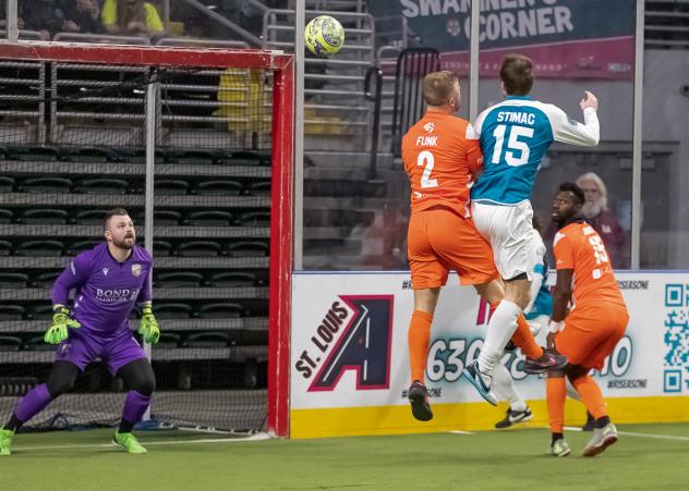 Florida Tropics' Skylar Funk and St. Louis Ambush's Billy Stimac in action