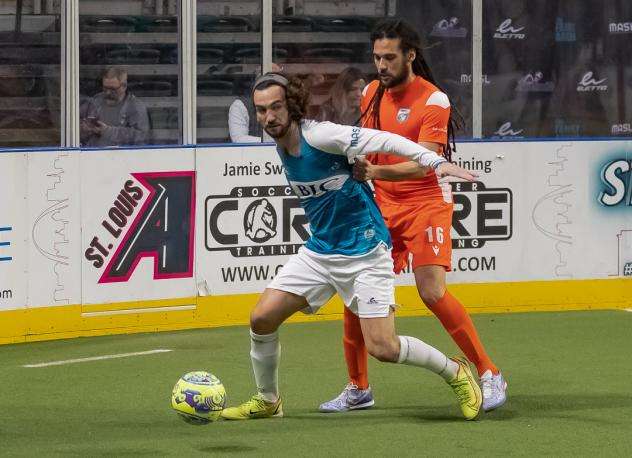 St. Louis Ambush's Brian Bement and Florida Tropics' Drew Ruggles on the field
